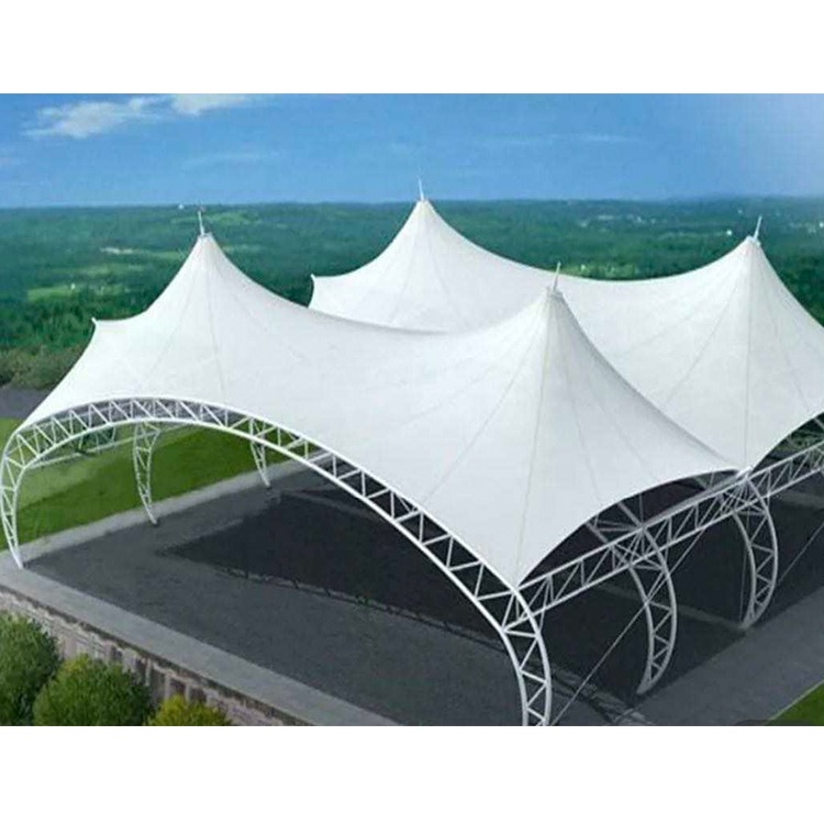Four-peak tensile membrane sport court cover over an outdoor court
